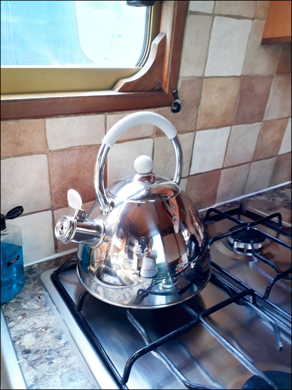 A photograph of a kettle on hob